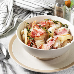 Baeckeoffe made from baked potatoes and bacon.Traditional French dish