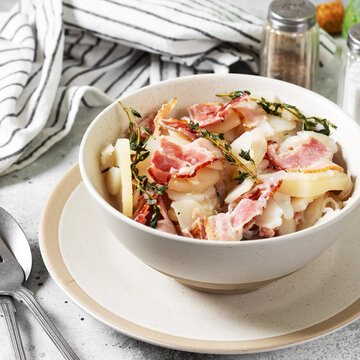 Baeckeoffe made from baked potatoes and bacon.Traditional French dish