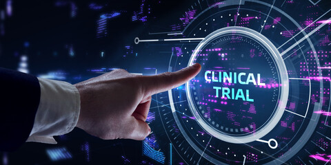 Business, technology, internet and networking concept. Young entrepreneur showing keyword: Clinical...