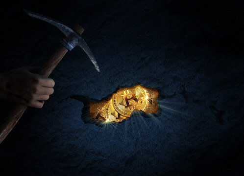 Miner digging golden bitcoins with a pickaxe. Mining bitcoin concept.