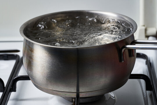 Pot with water boiling