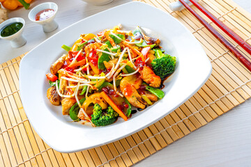 sweet and sour chicken with rice and vegetables