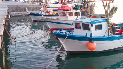Fototapeta na wymiar Ligurian boat moored in the ancient port of Imperia Oneglia