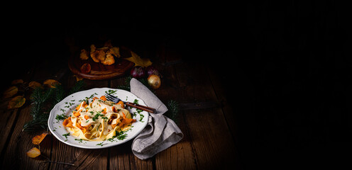 Tagliatelle with fresh chanterelles in a mushroom sauce