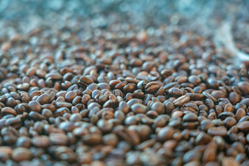 Coffee beans close up with smoke