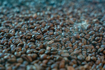 Coffee beans close up with smoke