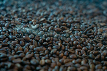 Coffee beans close up with smoke