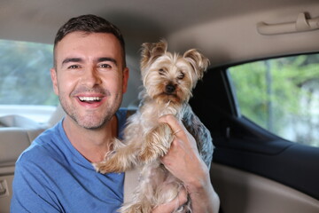 Handsome man traveling with his dog