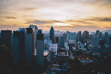 Modern city centre with skyscrapers at sunrise