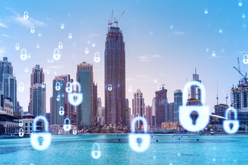 Skyscrapers of Dubai business downtown. International hub of trading and financial services. Lock...
