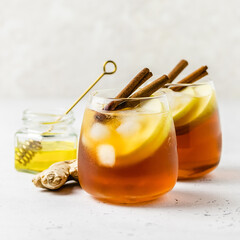 Apple honey iced tea in glasses. Space ofr text.