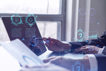 Two information technology specialist brainstorming on project to create a new approach to develop...