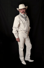  The cowboy with mustache in a white hat, smoking a pipe