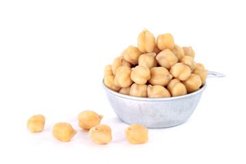 Boiled Chickpeas In a tin bowl. Isolated white background