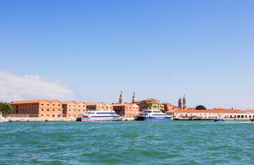 Venetian buildings view from the the Grand Canale in Venice, Italy. Italian buildings cityscape. Famous romantic city on water