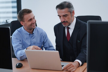 Businesspeople discussing together about the project ideas and brainstorming, in the meeting at office. 