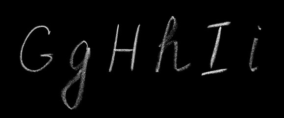 Uppercase and lowercase letters G, H, I of the English alphabet written by hand in chalk on a blackboard isolated on a black background. Design elements, chalk font