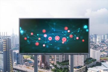 Technology hologram on billboard over panorama city view of Kuala Lumpur. KL is the largest tech hub in Malaysia, Asia. The concept of developing coding and high-tech science.