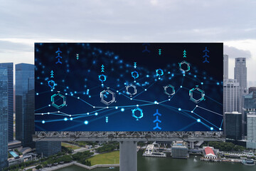 Technology hologram on billboard over panorama city view of Singapore. The largest tech hub in Southeast Asia. The concept of developing coding and high-tech science.