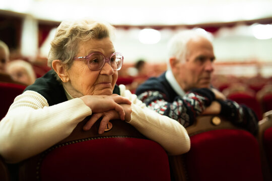 Elderly Woman Enjoying Performance At Opera And Ballet Theater