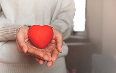 Red hearts with loving and caring adults. Symbol of support that expresses love valentine day and world heart day, heart health concept