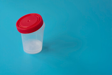 Sperm bank for artificial insemination, infertility treatment, child planning. Donor sperm on a blue background