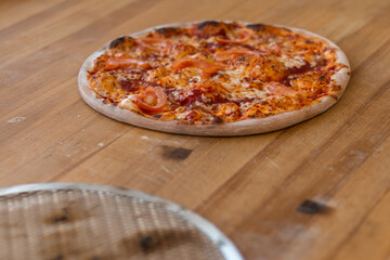 Pizza and baking grid on a cutting board