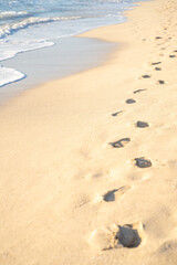 Footprints in the sand of Es Trenc beach. Palma de Mallorca, Spain