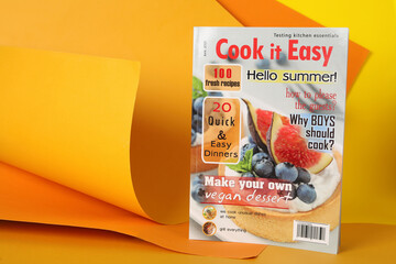 Modern culinary magazine on bright background. Space for text