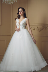 Beautiful sensual bride in light interior