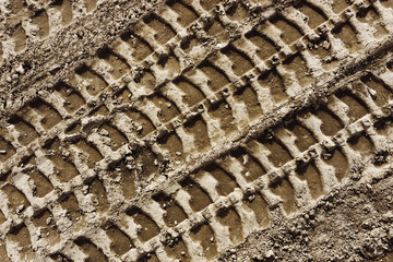 Tyre mark background. Tire track shape. Trail lines on dry brown sand pattern. Road construction...