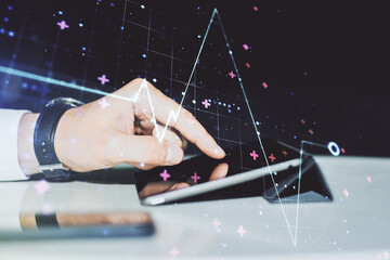 Creative abstract heart pulse hologram and finger presses on a digital tablet on background, online medical consulting concept. Multiexposure