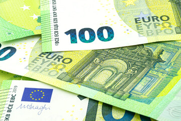Background made from a macro shot of a European Union banknote of 100 EUR.