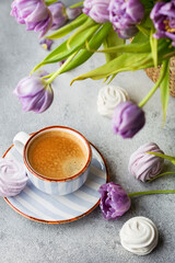Obraz na płótnie Canvas Spring Flat lay with coffee, tulips and marshmallows