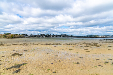 Brittany, Ile aux Moines island in the Morbihan gulf, the church and the Port-Miquel beach, beautiful light
