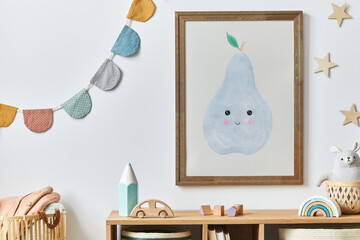 Stylish scandinavian newborn baby room with brown wooden mock up poster frame, toys, plush animal...