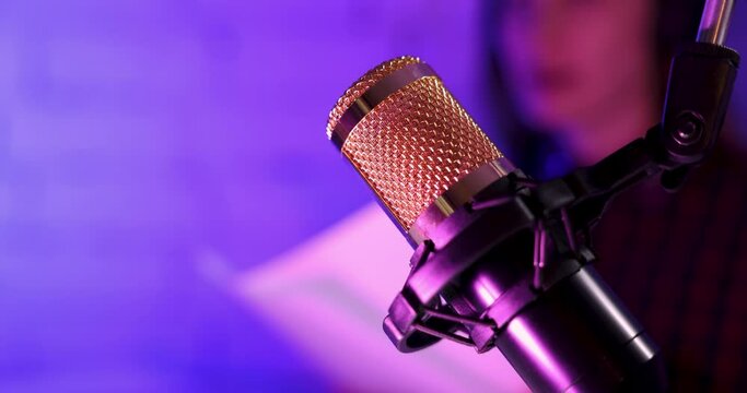 recording online podcast with professional microphone in studio. copy space