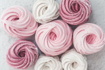 Obraz na płótnie Canvas Homemade pink zephyr, marshmallow, meringue. Handmade creamy sweets.