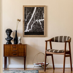 Modern composition of living room interior with brown mock up poster frame, design retro commode, vintage chair, flowers in vase and elegant accessories. Template. Stylish home staging. Japandi.