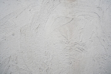 Decorative plaster. Grey wall texture background. Concrete style. Restoration indoors. Maintenance works. Renovation at home.