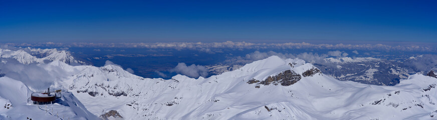 Mountain panorama of the Bernese Alps with lake Thun in the background. Seen form mountain peak Piz...