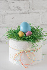 Funny easter present: Toilet paper roll with easter decoration