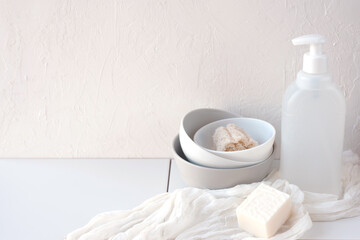 Fototapeta na wymiar Eco dishwashing liquid and clean bowls