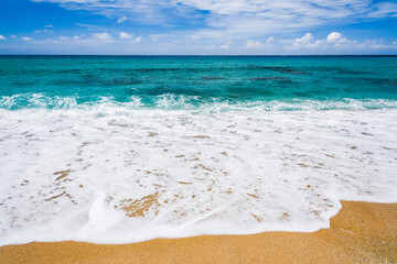 Sea wave with blue sky in the Kenting National Park of Pingtung, Taiwan.