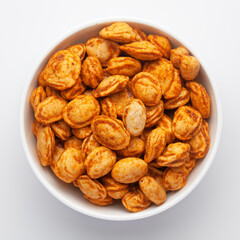 Roasted Crunchy Peanuts in a ceramic white bowl, made with peanuts. Pile of Indian spicy snacks (Namkeen), Top view