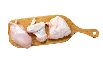 raw chicken chunks different parts of a poultry carcass breast, wings, thigh, chicken legs healthy diet meal top view copy space for text food background rustic image