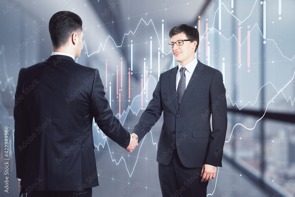 Poster deal and business partnership concept with businessmen handshaking on digital screen with financial 