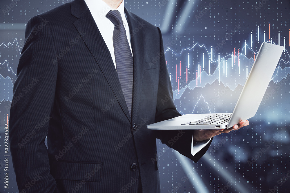 Poster stock market and trading concept with businessman with opened laptop on abstract digital background 