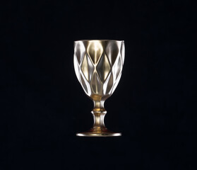 Fototapeta na wymiar ancient golden wine glass isolated on black background