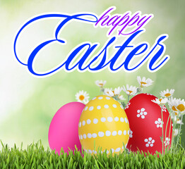 Happy Easter. Bright eggs and spring flowers on green grass outdoors